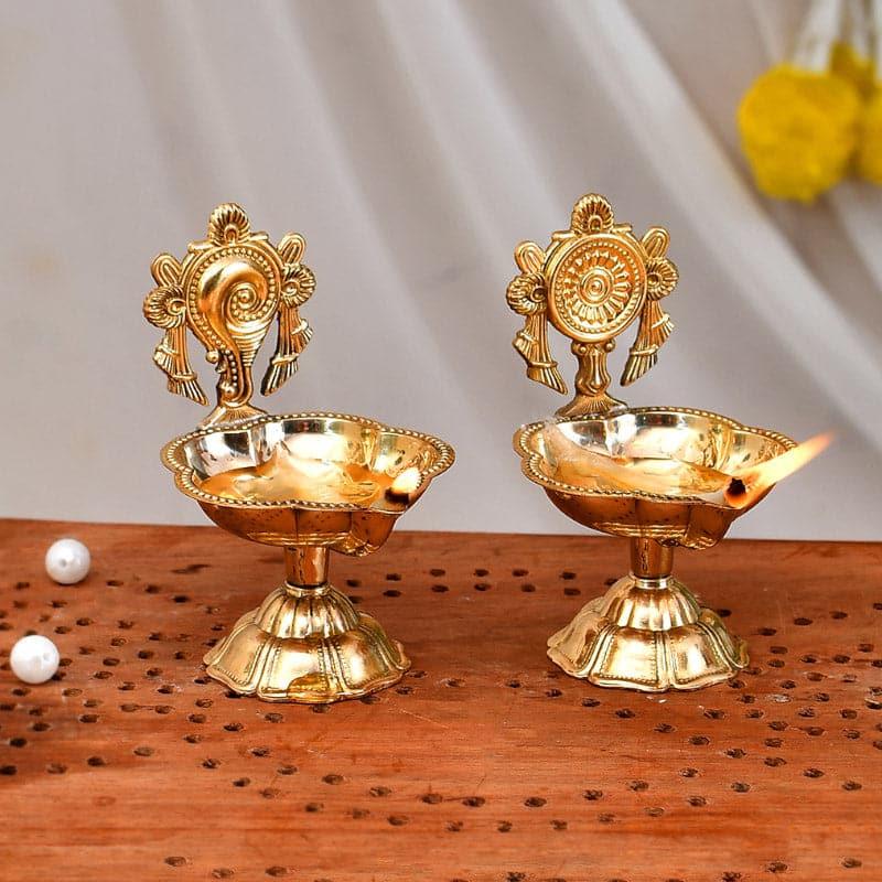 Buy Diyas - Brass Shanku Chakra Diya - Set Of Two at Vaaree online