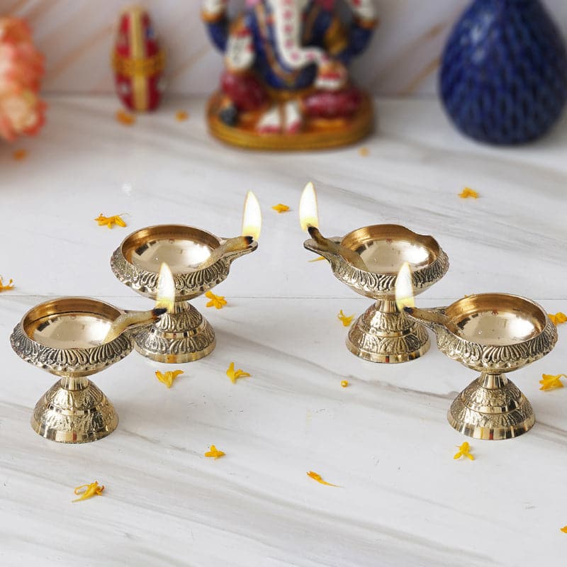 Buy Sirthi Brass Diya - Set Of Four Diyas from Vaaree