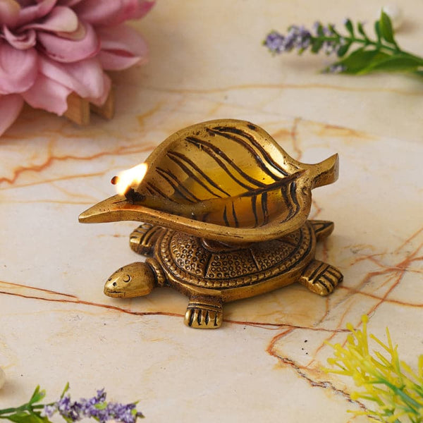 Buy Shreepa Tortoise Brass Diya Diyas from Vaaree