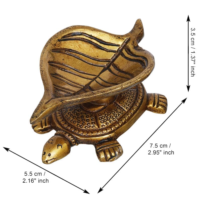 Buy Shreepa Tortoise Brass Diya - Set Of Two Diyas from Vaaree