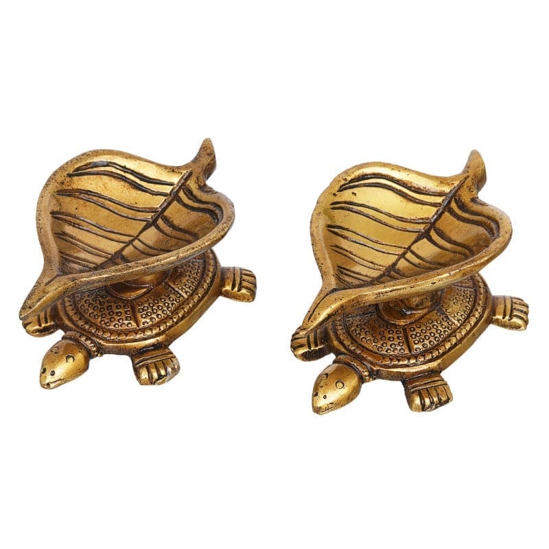 Buy Shreepa Tortoise Brass Diya - Set Of Two Diyas from Vaaree