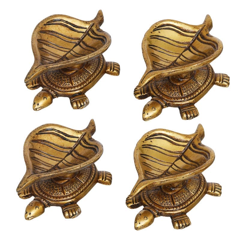 Buy Shreepa Tortoise Brass Diya - Set Of Four Diyas from Vaaree