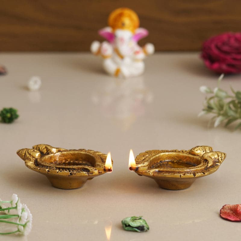 Buy Pritika Godess Lakshmi And Lord Ganesha Diya - Set Of Two Diyas from Vaaree