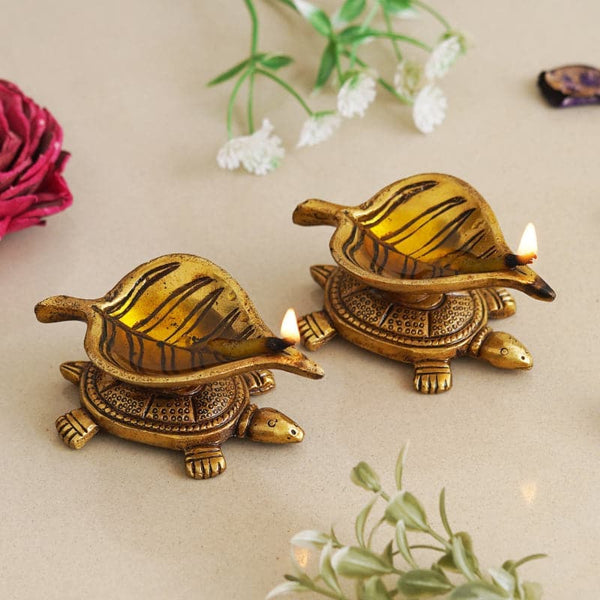 Buy Shreepa Tortoise Brass Diya - Set Of Two Diyas from Vaaree