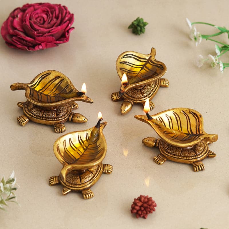 Buy Shreepa Tortoise Brass Diya - Set Of Four Diyas from Vaaree