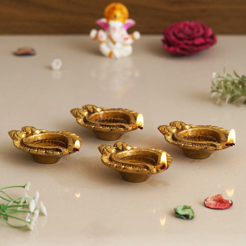 Buy Pritika Godess Lakshmi And Lord Ganesha Diya - Set Of Four Diyas from Vaaree