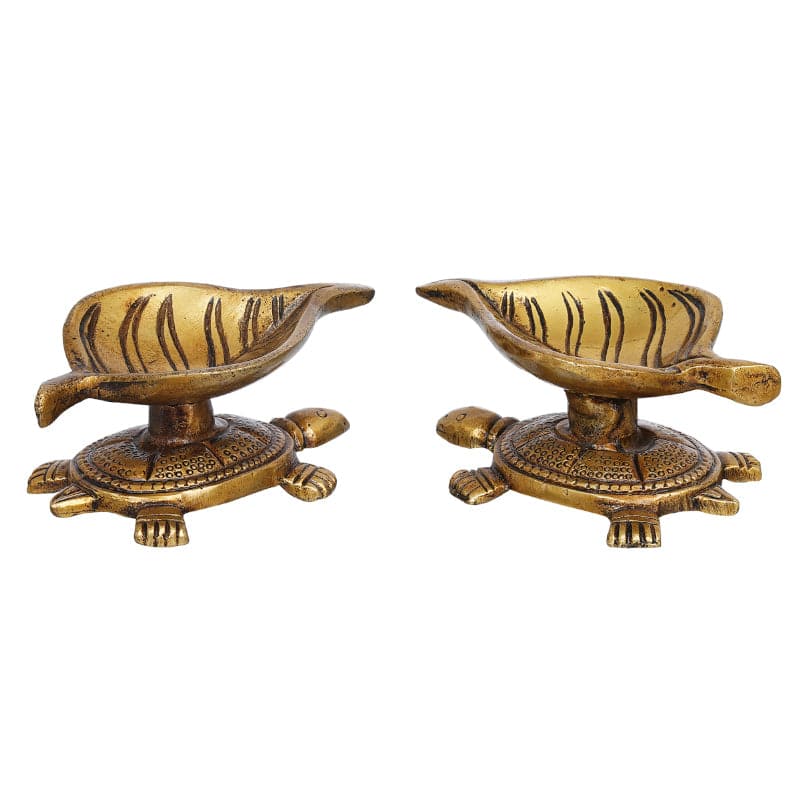 Buy Shreepa Tortoise Brass Diya - Set Of Two Diyas from Vaaree