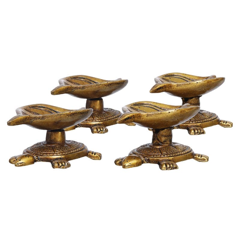 Buy Shreepa Tortoise Brass Diya - Set Of Four Diyas from Vaaree