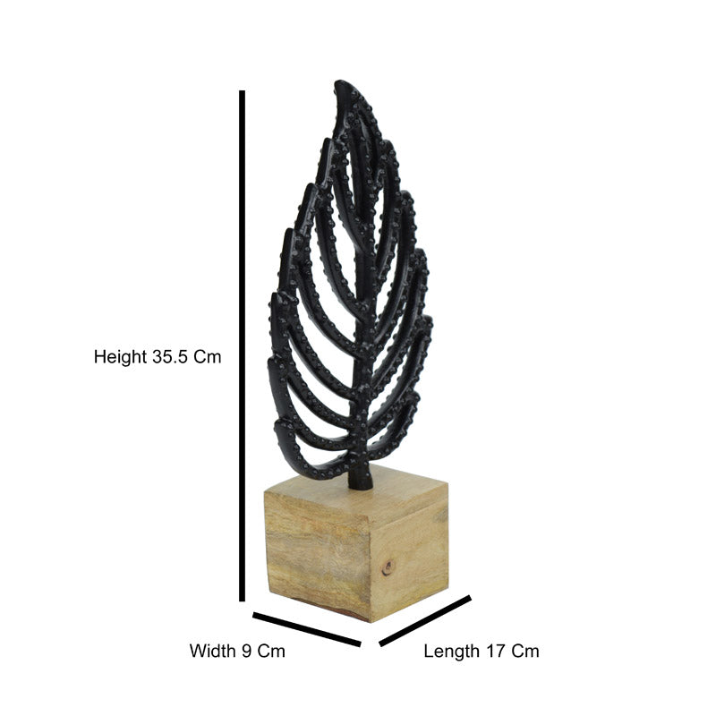 Buy The Leafy Lestora Showpiece - Black Showpieces from Vaaree