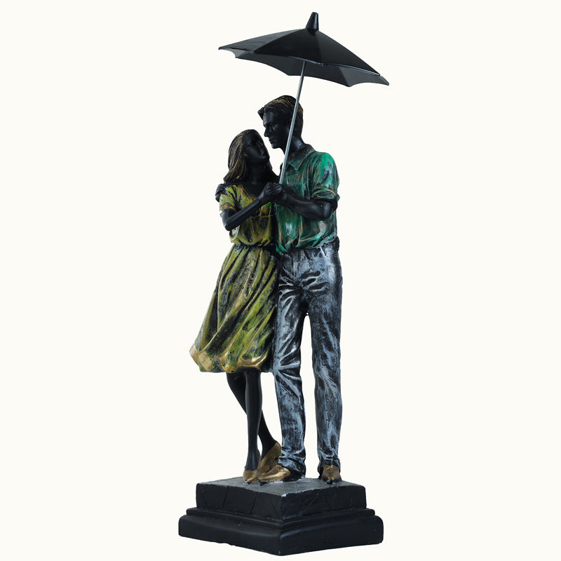 Buy Couple In Rain Showpiece Showpieces from Vaaree