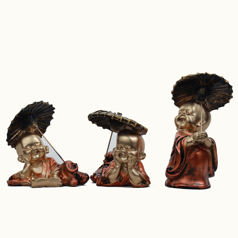 Buy Joyful Little Monk Showpiece Showpieces from Vaaree