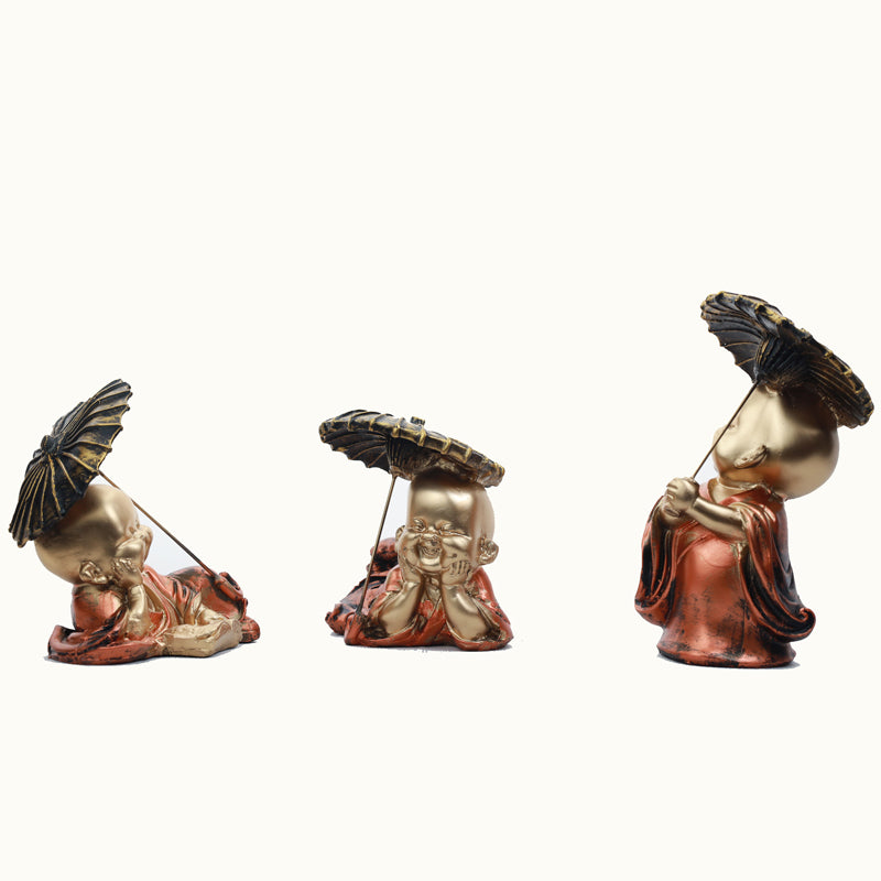 Buy Joyful Little Monk Showpiece Showpieces from Vaaree