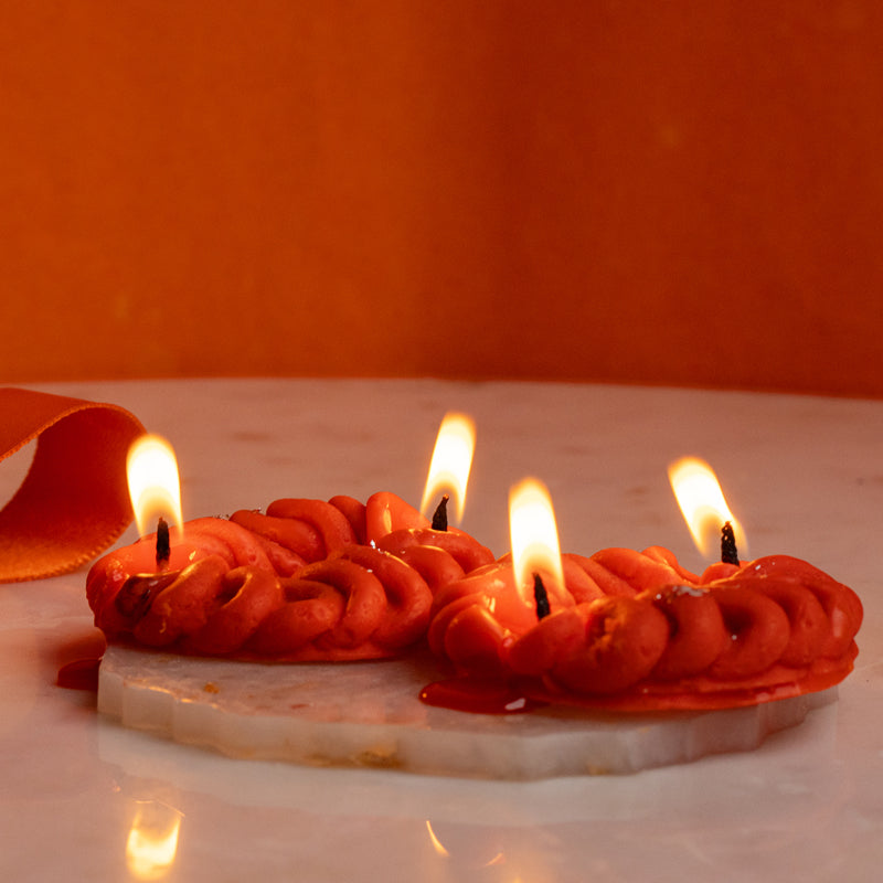 Buy Jalebi Orange Scented Candle - Set Of Two Candles from Vaaree