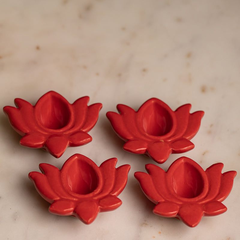 Buy Ambuj Ceramic Diya - Set Of Four Diyas from Vaaree