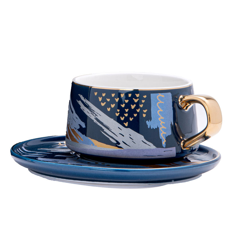 Buy Alessi Abstract Blue Cup & Saucer (250 ML) - Three Piece Set Tea Cup & Saucer from Vaaree