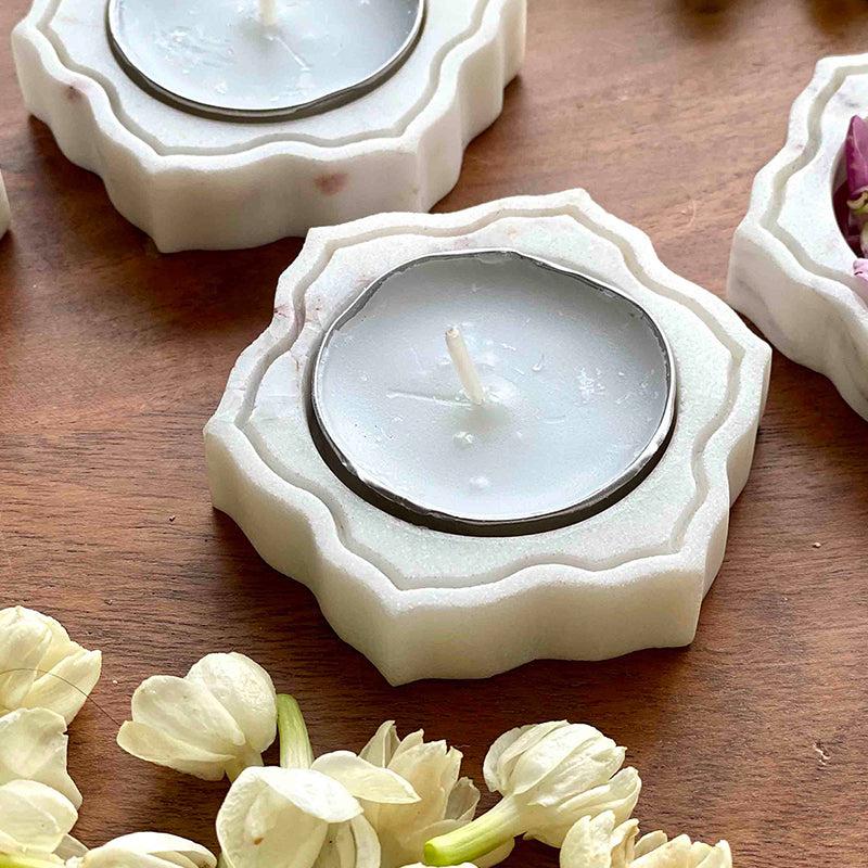 Buy Madhura Marble Tealight Candle Holder - Set Of Four Candle Holders from Vaaree