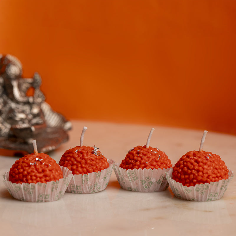 Buy Motichoor Laddu Orange Scented Candle - Set Of Four Candles from Vaaree