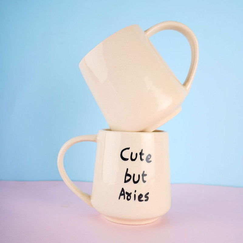 Buy Cute But Aries Cup - 250 ML Mug & Tea Cup from Vaaree