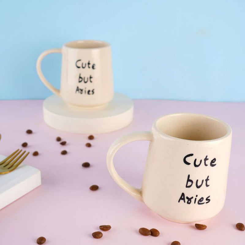 Buy Cute But Aries Cup - 250 ML Mug & Tea Cup from Vaaree