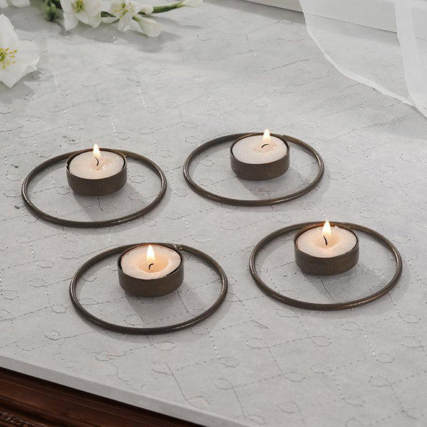 Buy Idola Tealight Candle Holder (Copper) - Set of Four Tea Light Candle Holders from Vaaree