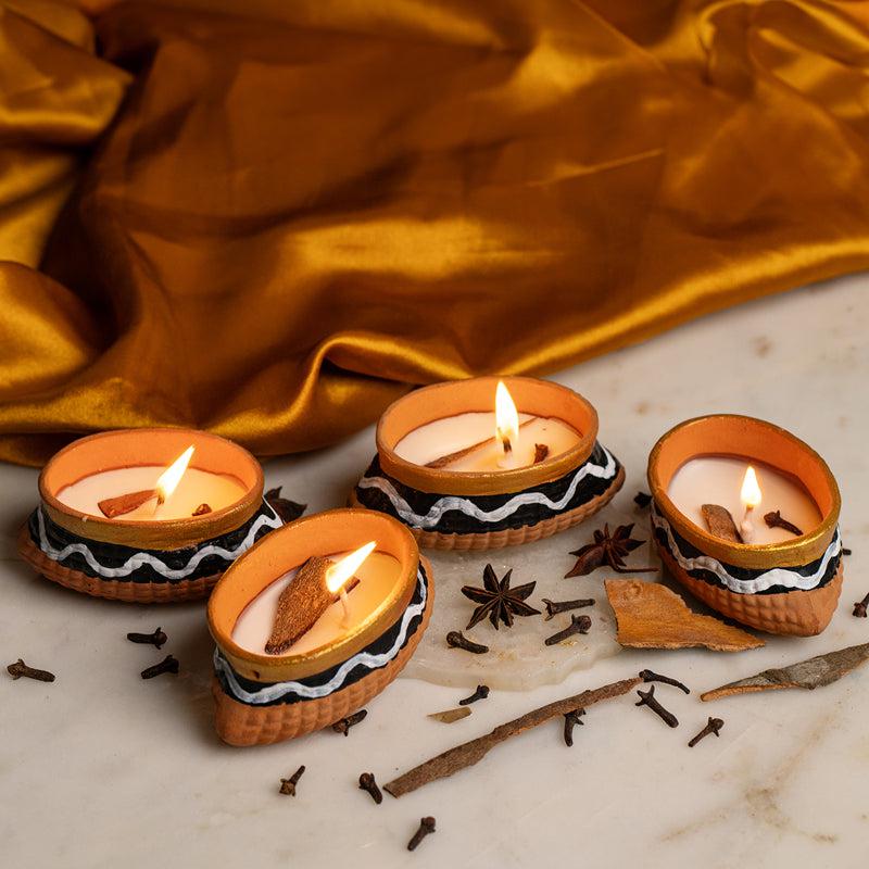 Buy Row Boat Handpainted Cinnamon Scented Candle - Set Of Four Candles from Vaaree