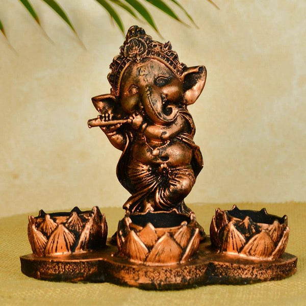 Buy Little Copper Ganesha Tealight Candle Holder Showpieces from Vaaree