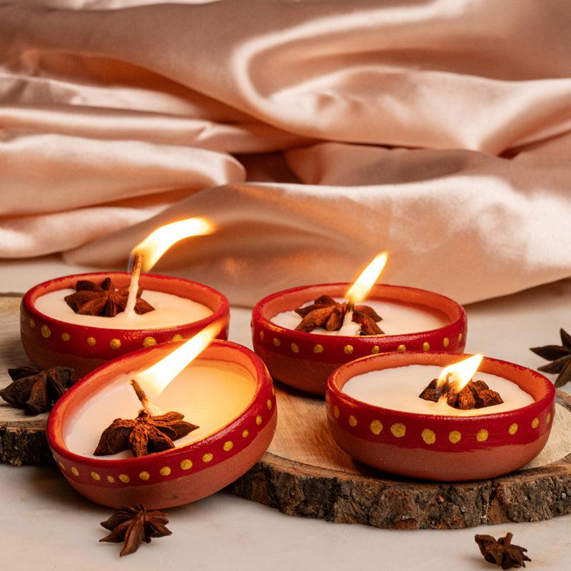 Buy Miya Handpainted Cinnamon Scented Candle - Set Of Four Candles from Vaaree