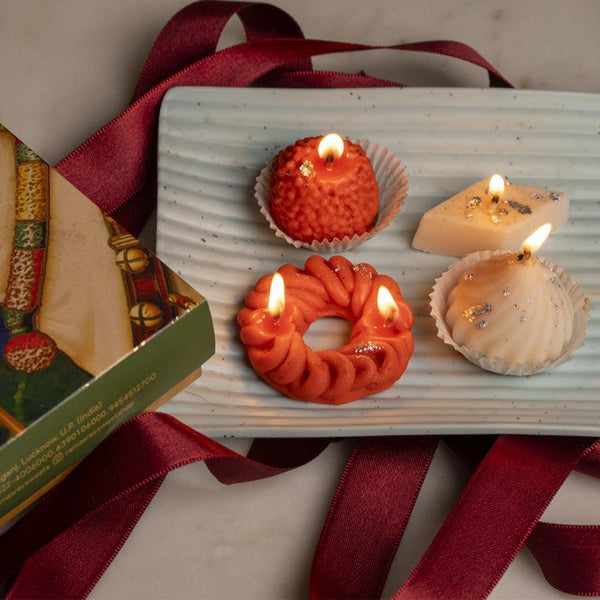 Buy Sweet Savour Orange Scented Candle - Set Of Four Candles from Vaaree