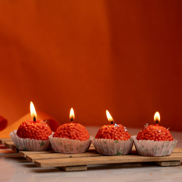 Buy Motichoor Laddu Orange Scented Candle - Set Of Four Candles from Vaaree