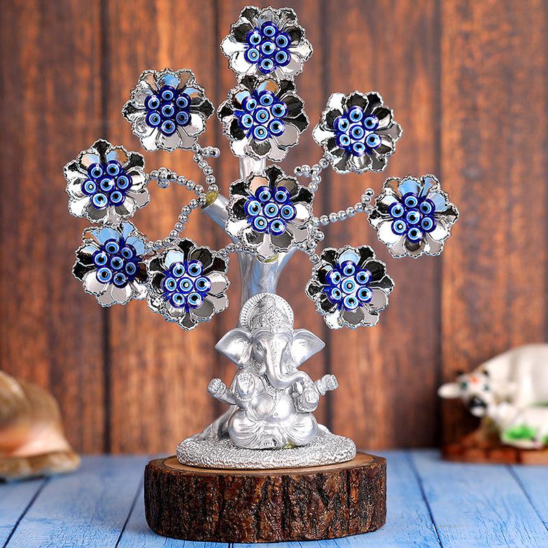 Buy Ganesha Tree Of Life Showpiece Showpieces from Vaaree