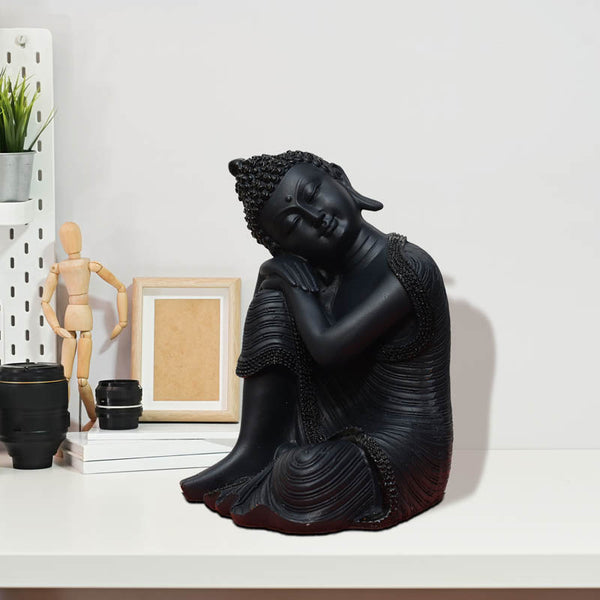 Buy Zen Resting Buddha Showpiece - Black Showpieces from Vaaree