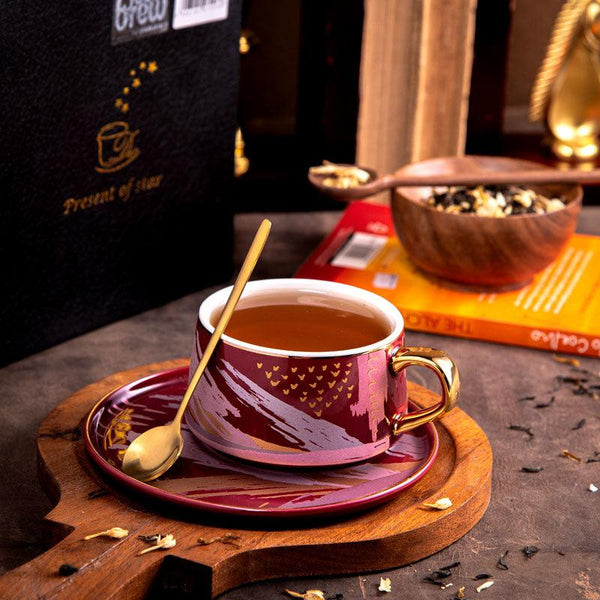 Buy Alessi Abstract Red Cup & Saucer (250 ML) - Three Piece Set Tea Cup & Saucer from Vaaree