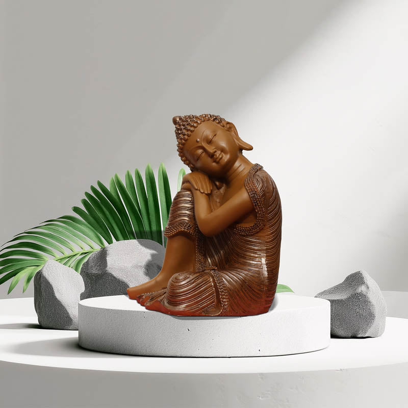 Buy Zen Resting Buddha Showpiece - Brown Showpieces from Vaaree