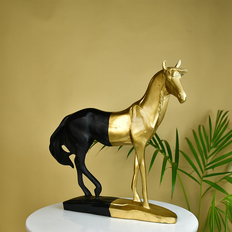 Buy Turaga Naksh Showpiece - Black & Gold Showpieces from Vaaree