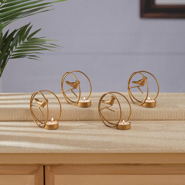 Buy Alaiza Chirp Tealight Candle Holder (Gold) - Set of Four Tea Light Candle Holders from Vaaree