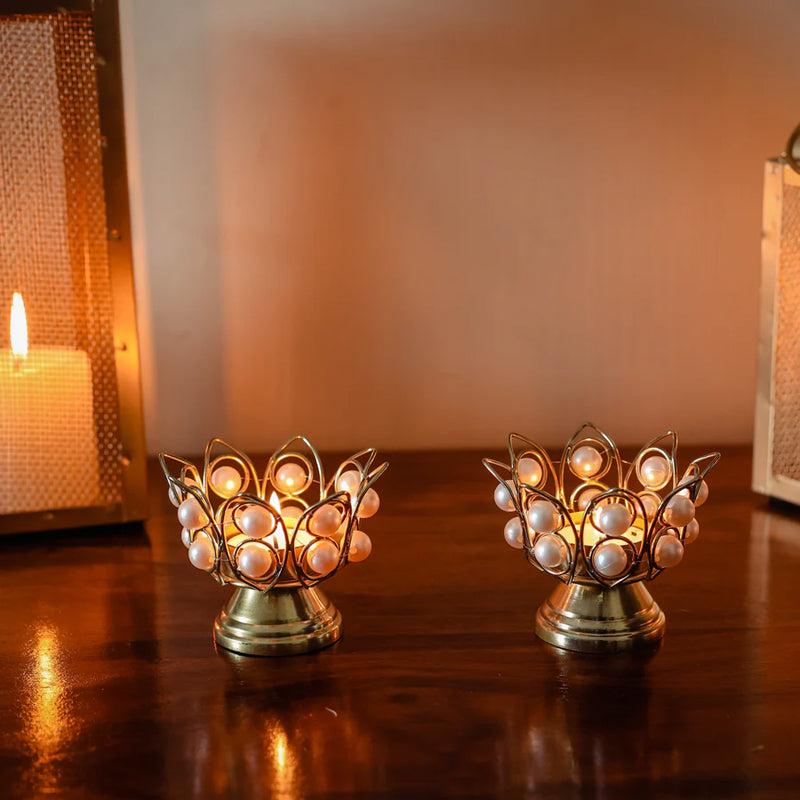 Buy Pearl Pushp Tealight Candle Holder - Set Of Two Tea Light Candle Holders from Vaaree