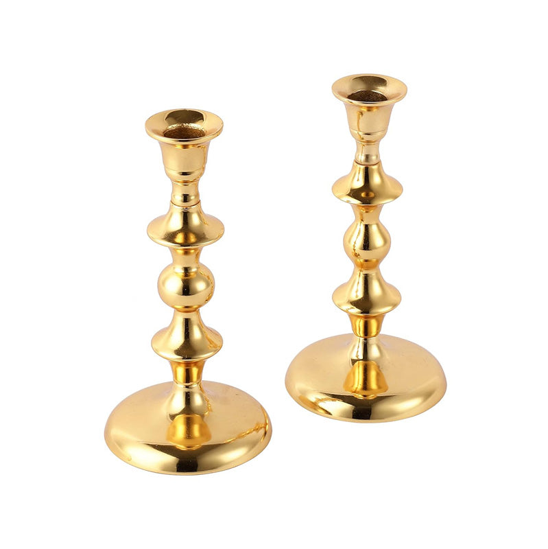 Buy Ottista Taper Candle Holder (Gold) - Set Of Two Candle Holders from Vaaree