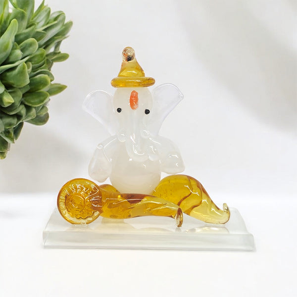 Buy Om Ganesha Murti Glass Idol Showpiece from Vaaree