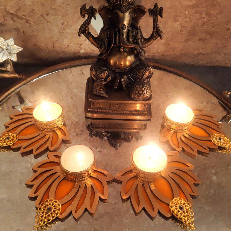 Buy Kamala Shine Tealight Candle Holder (Yellow) - Set Of Four Tea Light Candle Holder from Vaaree