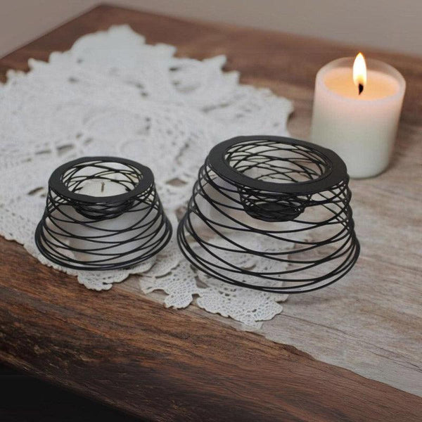 Buy Spiral Black Tealight Candle Holder - Set Of Two Tea Light Candle Holders from Vaaree