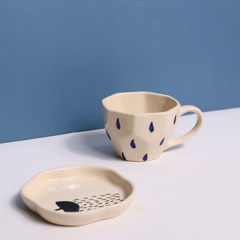 Buy On A Rainy Day Cup & Saucer (200 ML) - Two Piece Set Tea Cup & Saucer from Vaaree