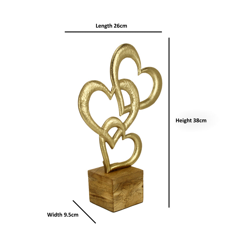 Buy Lovely Loop Showpiece - Gold Showpieces from Vaaree