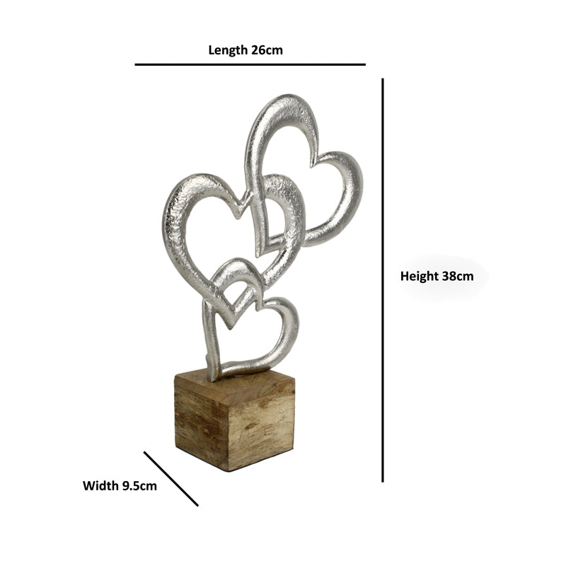 Buy Lovely Loop Showpiece - Silver Showpieces from Vaaree