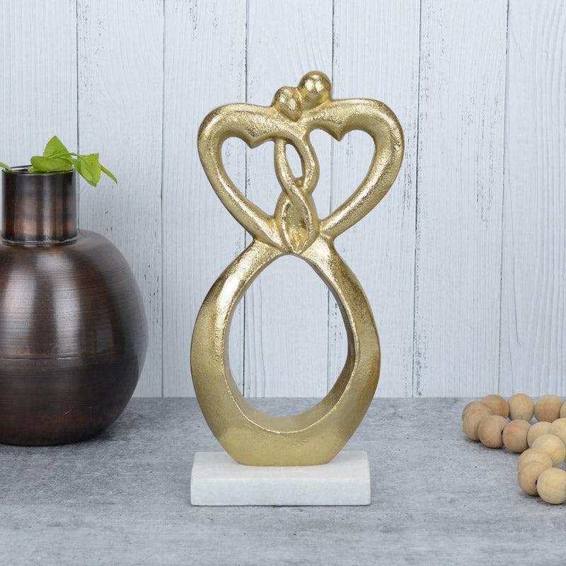 Buy Couple Loop Showpiece Showpieces from Vaaree