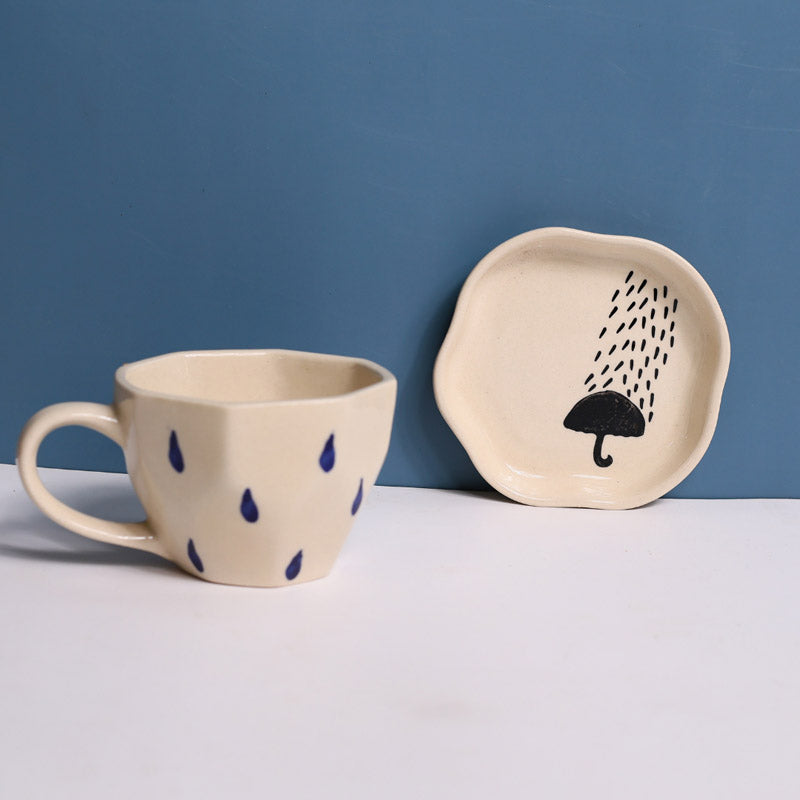 Buy On A Rainy Day Cup & Saucer (200 ML) - Two Piece Set Tea Cup & Saucer from Vaaree