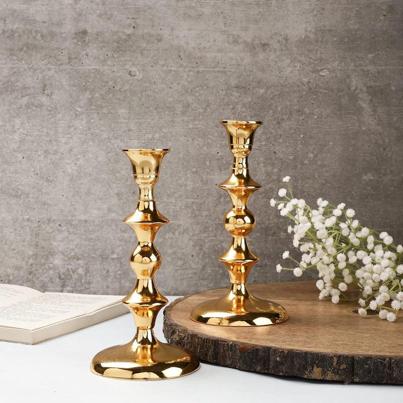 Buy Ottista Taper Candle Holder (Gold) - Set Of Two Candle Holders from Vaaree