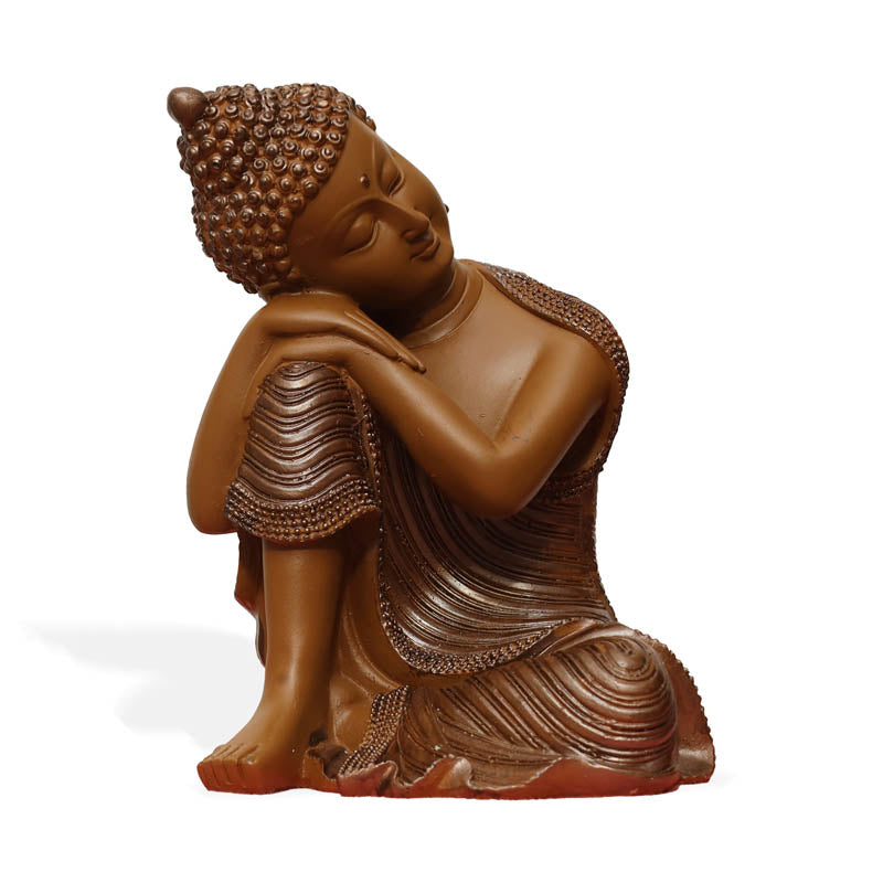 Buy Zen Resting Buddha Showpiece - Brown Showpieces from Vaaree