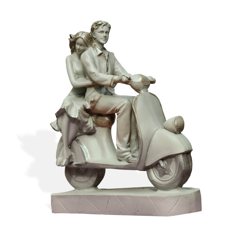 Buy Scooter Couple Showpiece Showpieces from Vaaree