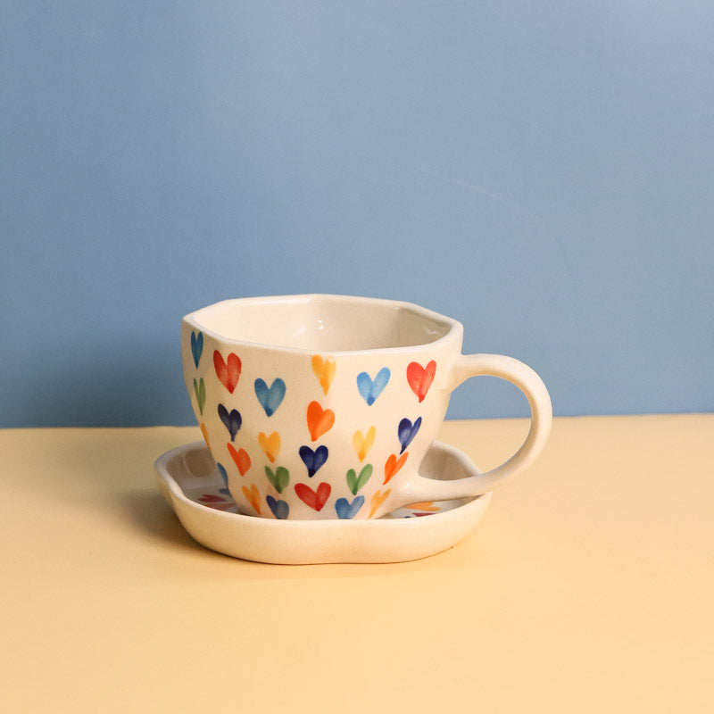 Buy Love Is Love Cup & Saucer (220 ML) - Two Piece Set Tea Cup & Saucer from Vaaree