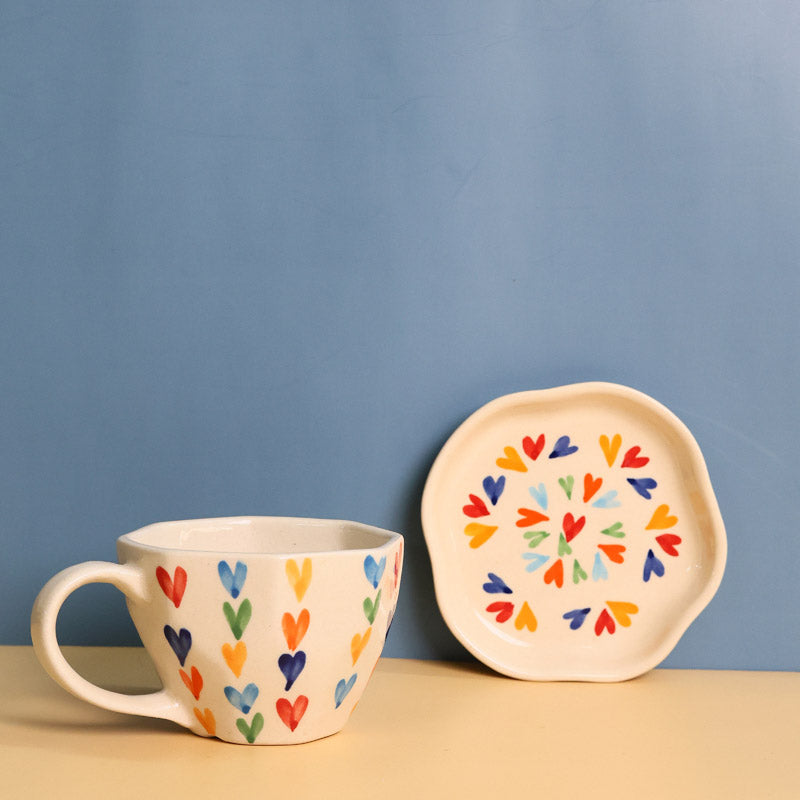 Buy Love Is Love Cup & Saucer (220 ML) - Two Piece Set Tea Cup & Saucer from Vaaree